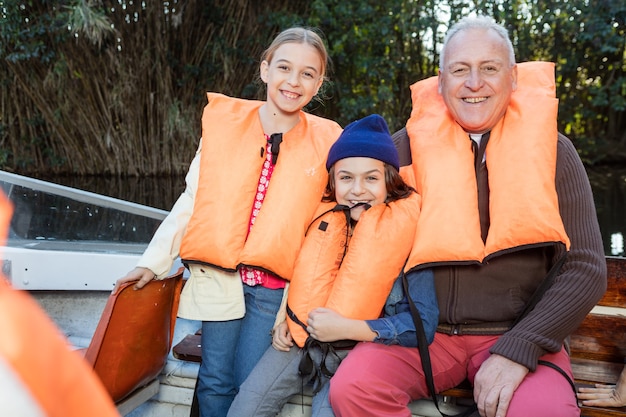 Grandfather having a great day with their grandchildren outdoors