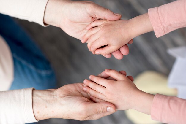 Grandma and girl holding hands