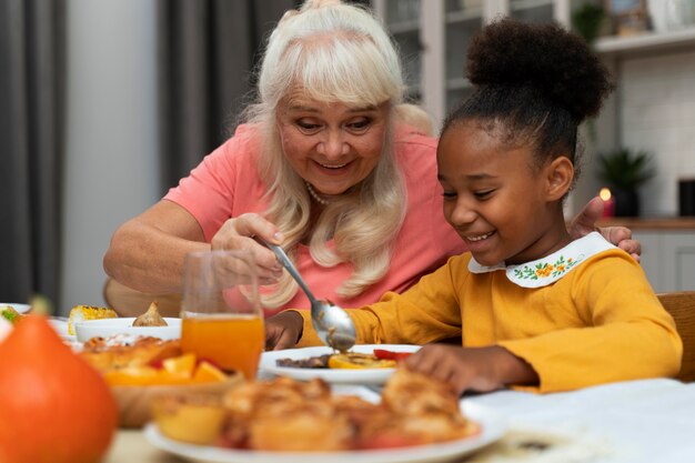 Grandma and grand daughter celebrating thanksgiving day