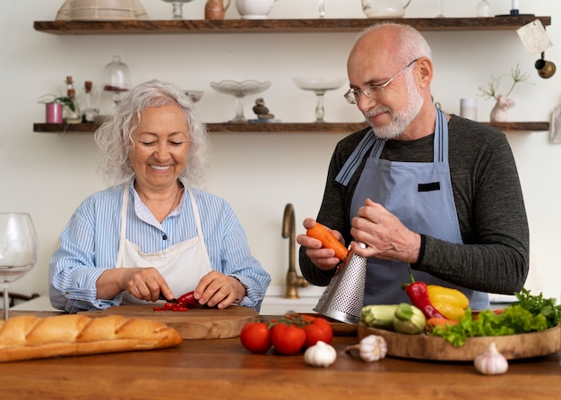 Free photo grandma and grandpa cooking together