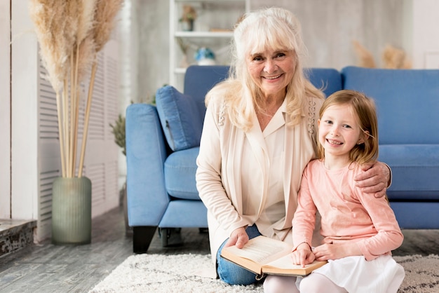 Grandma reading for girl