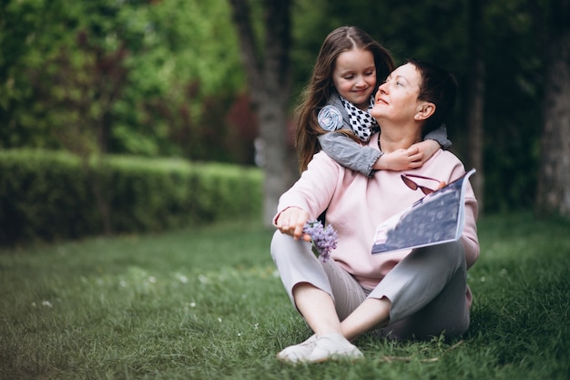 Free photo grandmother and grandchild in park