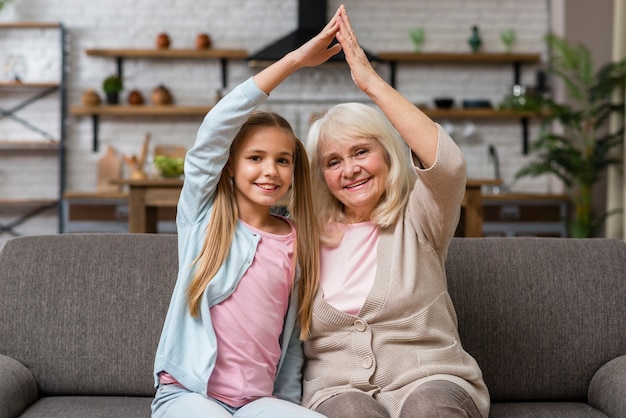 Grandmother and granddaughter fooling around