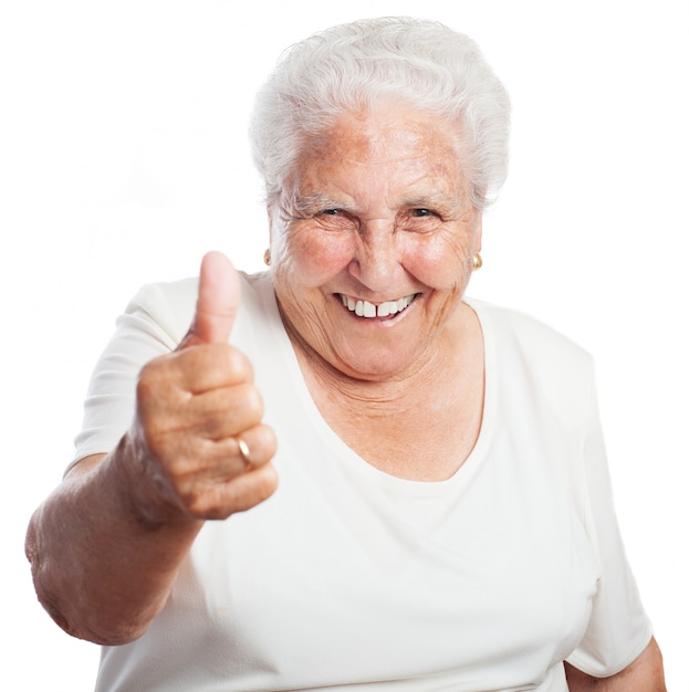 Grandmother with a raised thumb