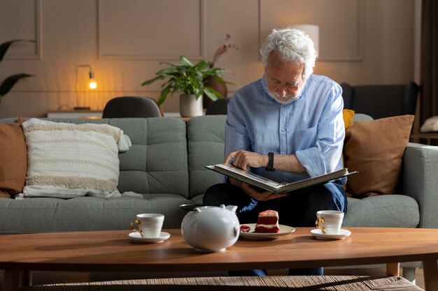 Grandpa looking over picture albums