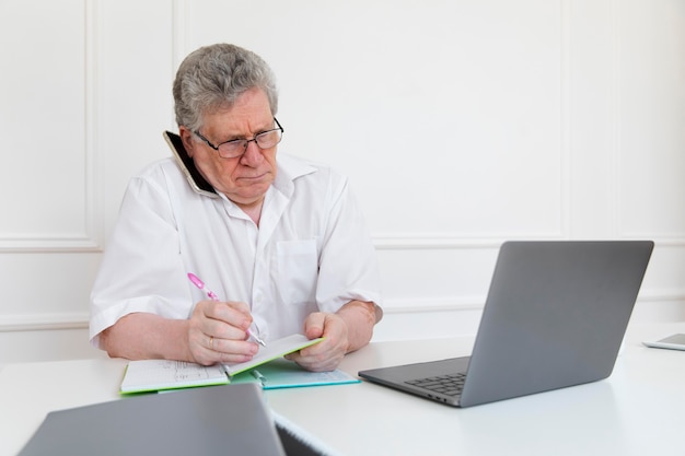 Grandparent learning to use digital device