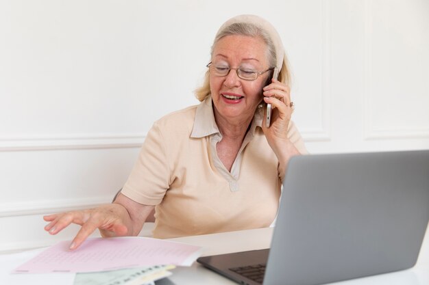 Grandparent learning to use digital device