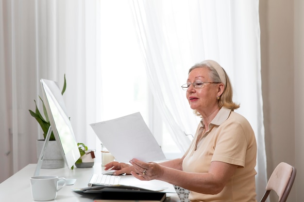 Grandparent learning to use digital device