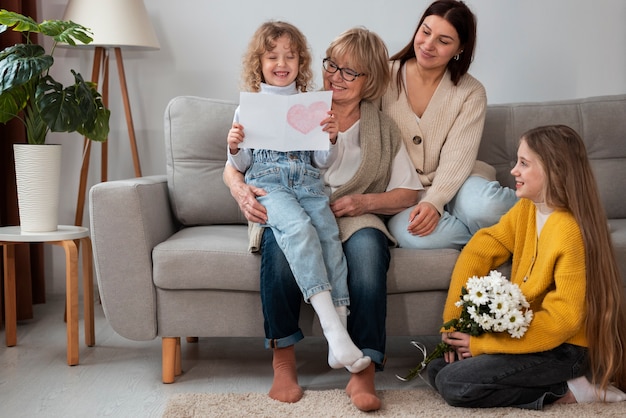 Free photo granny spending time with her grandchildren