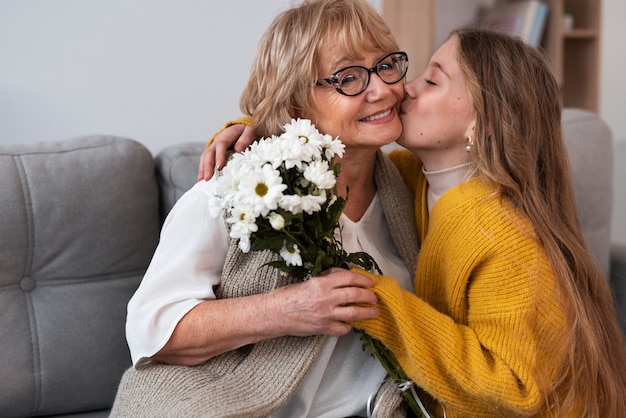 Free photo granny spending time with her grandchildren