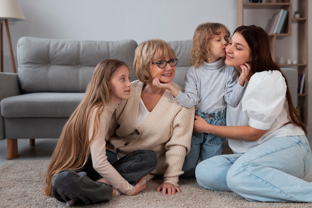 Free photo granny spending time with her grandchildren