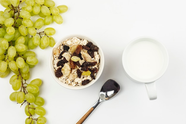 Grapes with oatmeal porridge and dry fruits