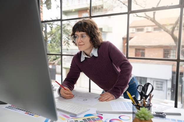 Graphic designer sketching a logo