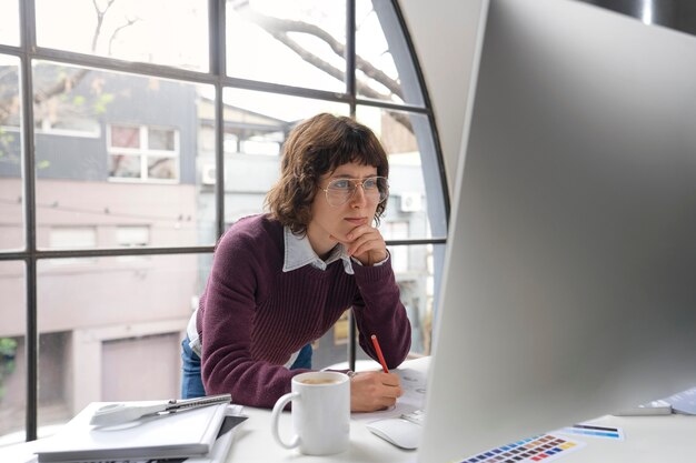 Graphic designer sketching a logo