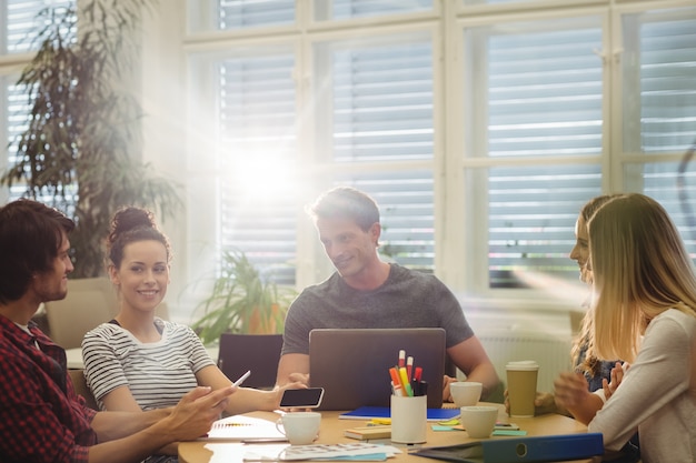 Free photo graphic designers in a meeting