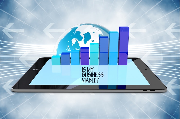 मुफ़्त फोटो graphic above a tablet