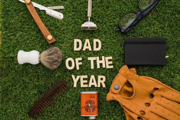 Grass surface with father's day objects