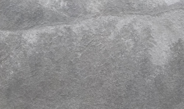 Free photo a gray background with a textured pattern of a stone wall.