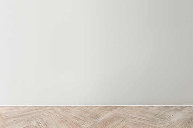 Gray blank concrete wall mockup with a wooden floor