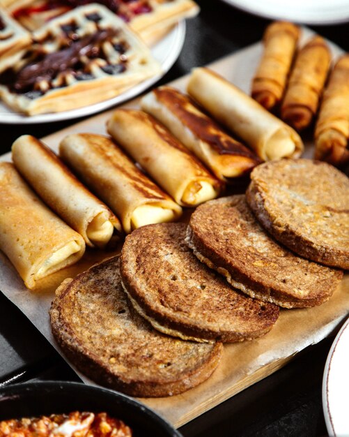 Gray bread and pancakes with waffles