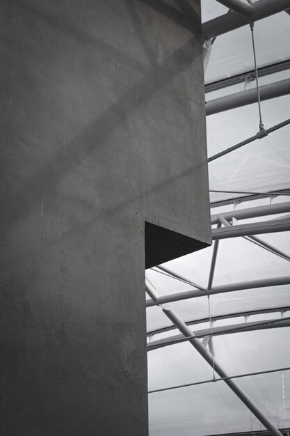 Gray concrete wall with glass ceiling