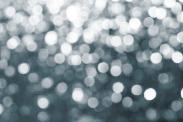 Free photo gray defocused glittery design