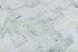 Бесплатное фото Серая краска жидкого мрамора с текстурой