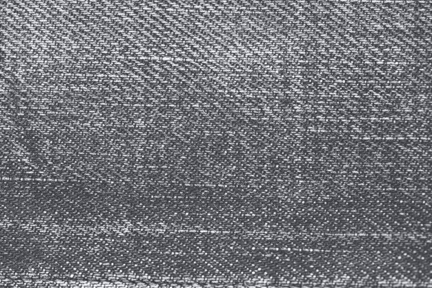 グレージーンズ生地織り目加工の背景