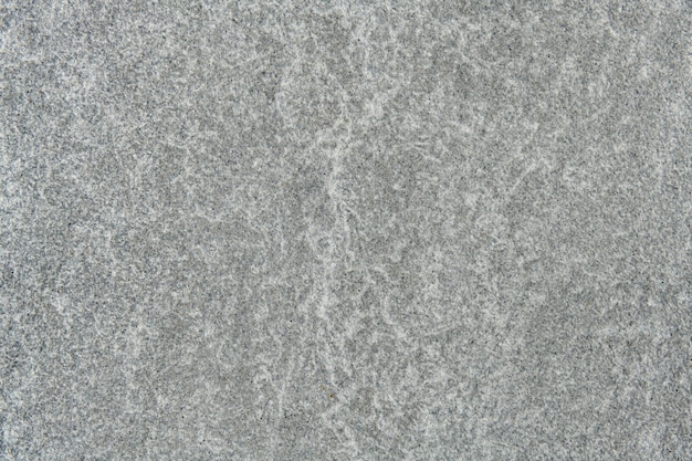 灰色の大理石模様の織り目加工の壁