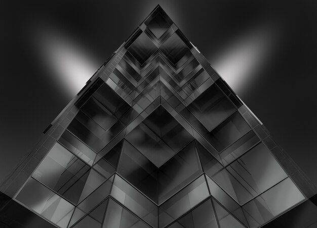 Gray scale low angle shot of a pyramid shaped glass building