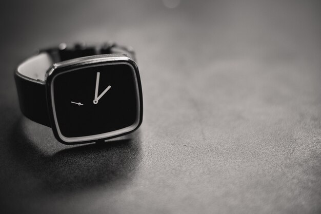 Gray scale shot of a black watch