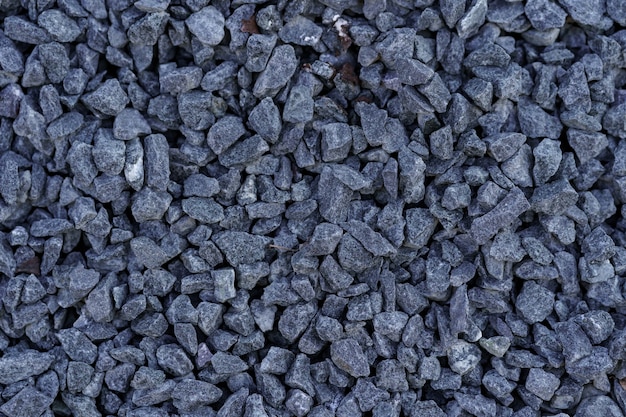 Gray small rocks ground texture.