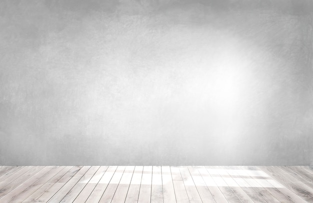 Gray wall in an empty room with a wooden floor