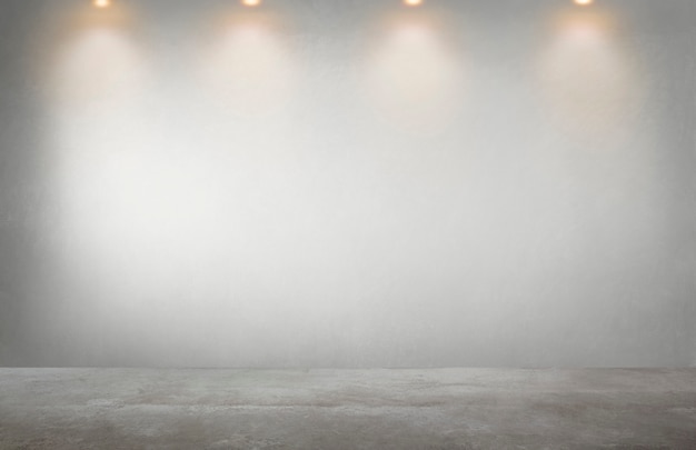 Gray wall with a row of spotlights in an empty room