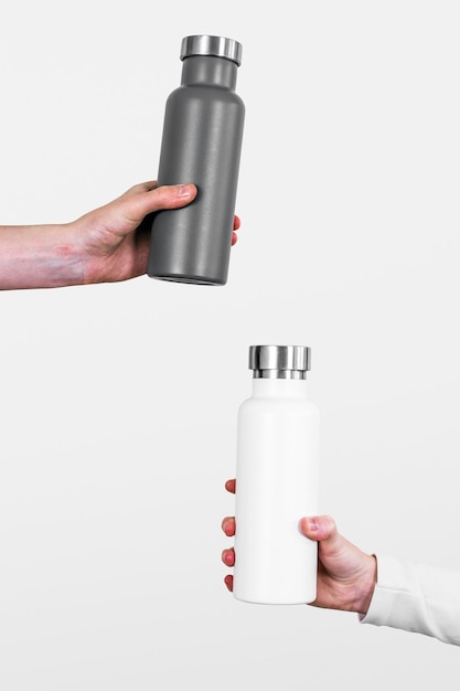 Gray and white water bottles