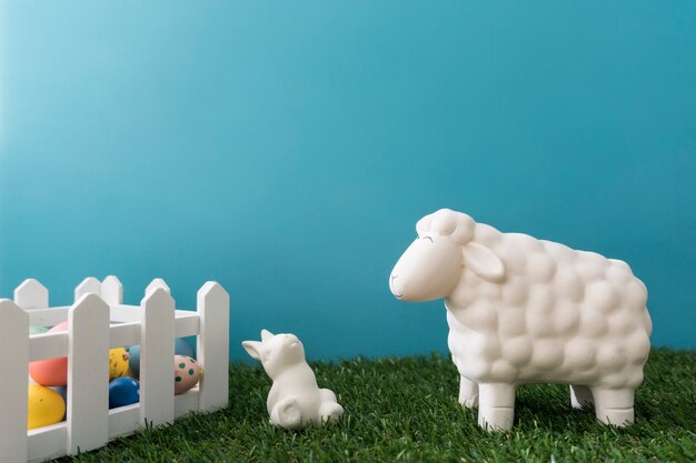 Great composition with sheep, rabbit and eggs for easter day