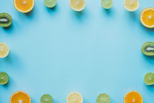 Great frame of fruits cut in half