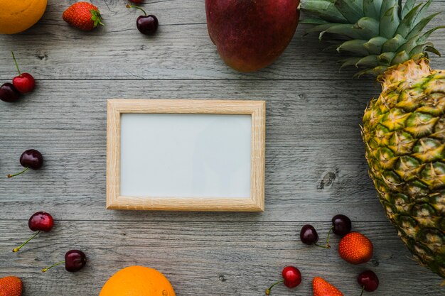 Great summer composition with tasty fruits and frame