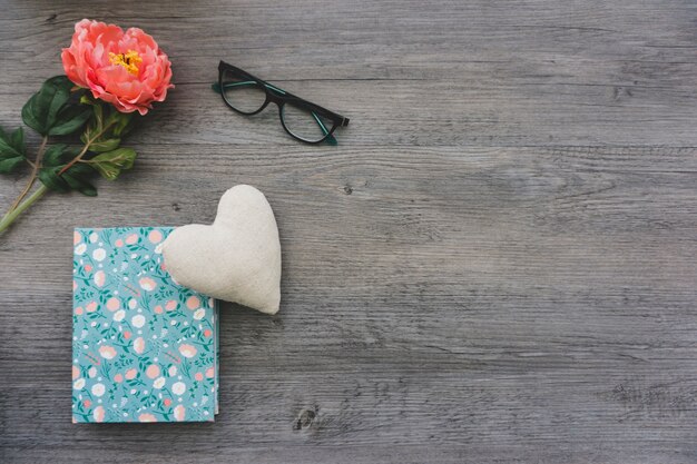Great surface with book, flower and glasses