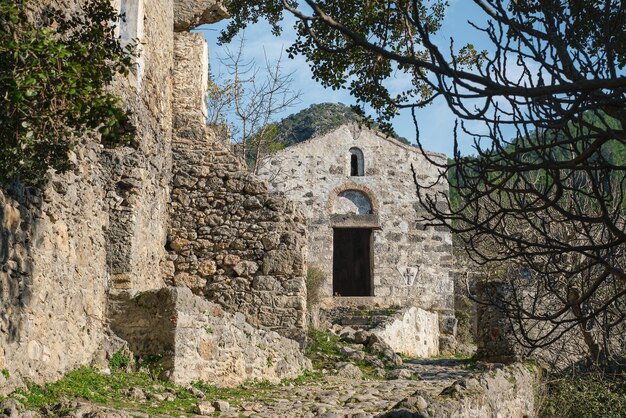 Greek chapel in an abandoned ghost town near Fethiye in Turkey Site of the ancient Greek city of Karmilissos 18th century summer holiday season