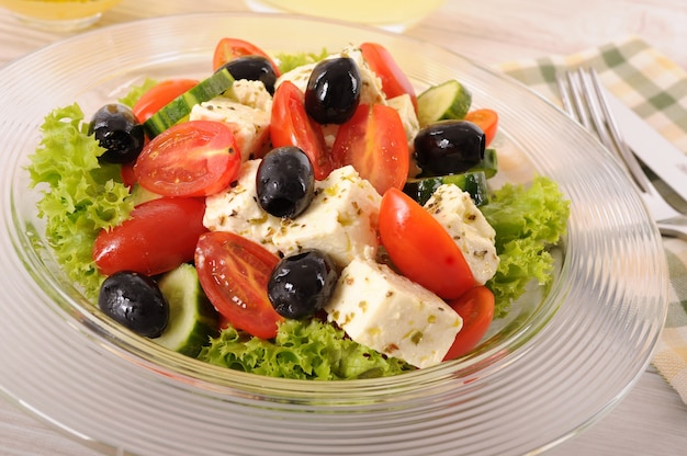 Greek salad in glass bowl