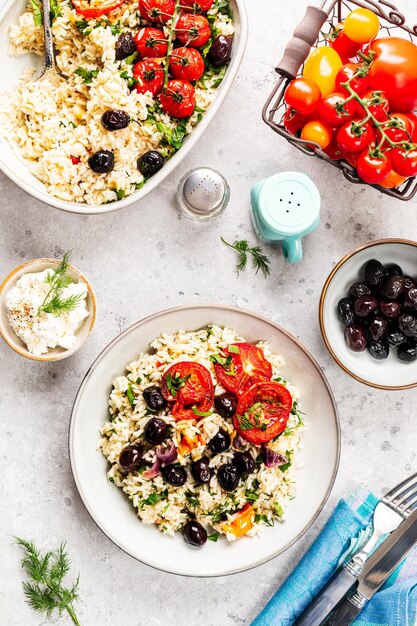 Free photo greek vegetable casserole with rice and tomatoes