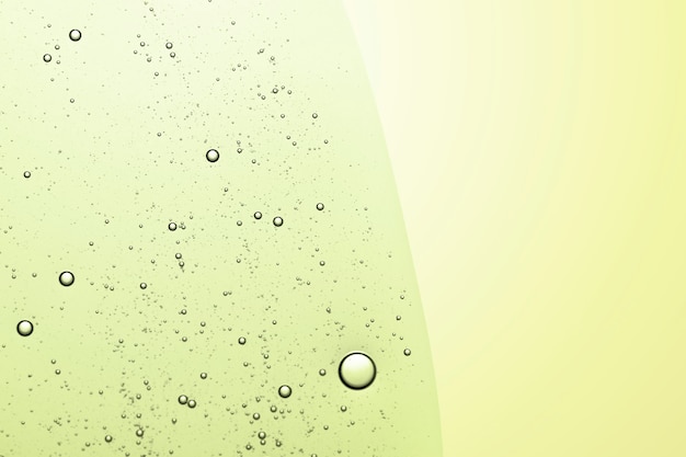 Free photo green abstract background oil bubble in water wallpaper