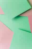 Бесплатное фото Зеленая и розовая бумага пастельных тонов текстуры фона