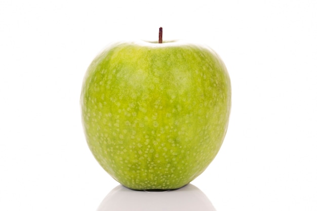 Green apple on white background in studio