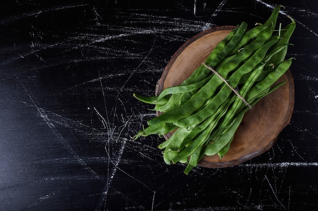 Green beans on black