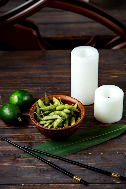 Green beans and a pair of limes