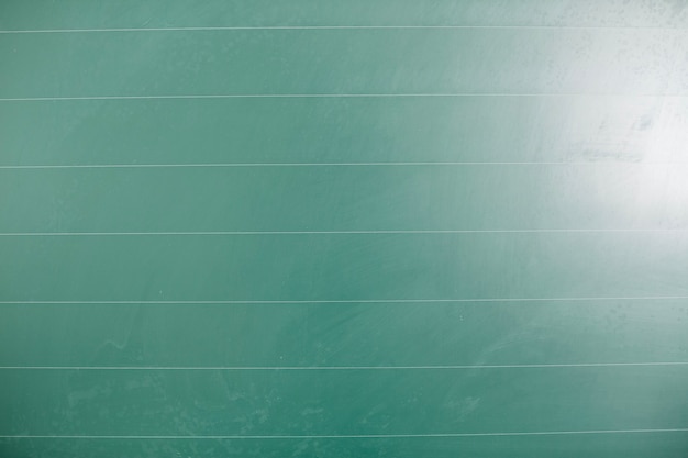 Free photo green blackboard with lines