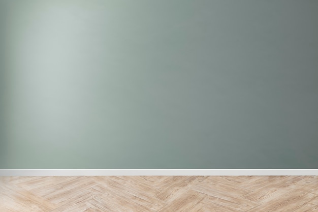 木の床と緑の空白のコンクリート壁のモックアップ