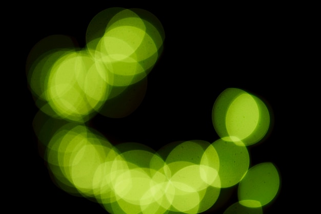 Free photo green blurry lights background